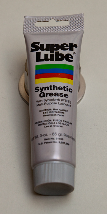 I used Super Lube because it was what the hardware store had in stock.  But any synthetic grease should work.  Super Lube is rated for temperatures from -45 to +450 degrees F.